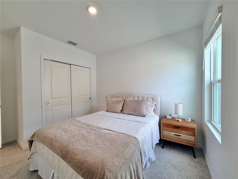 Furnished interior view inside a new home in Westview Community Group Page, Kissimmee (Image 15).