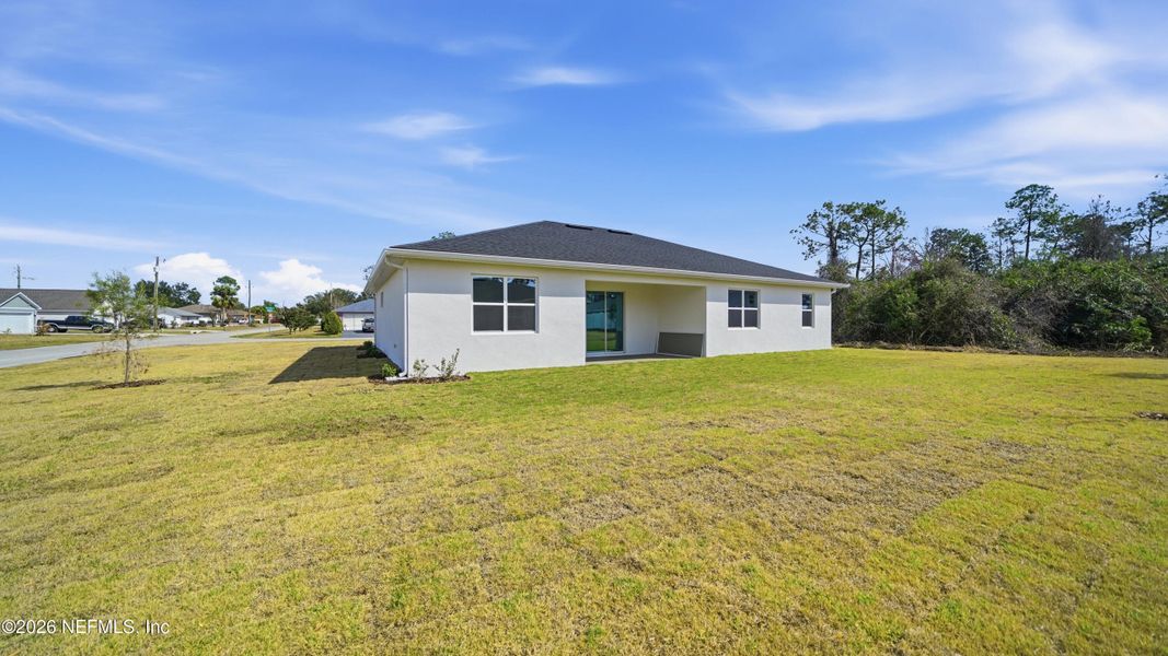 Exterior details and patio area of a home in , Palm Coast (Image 4).