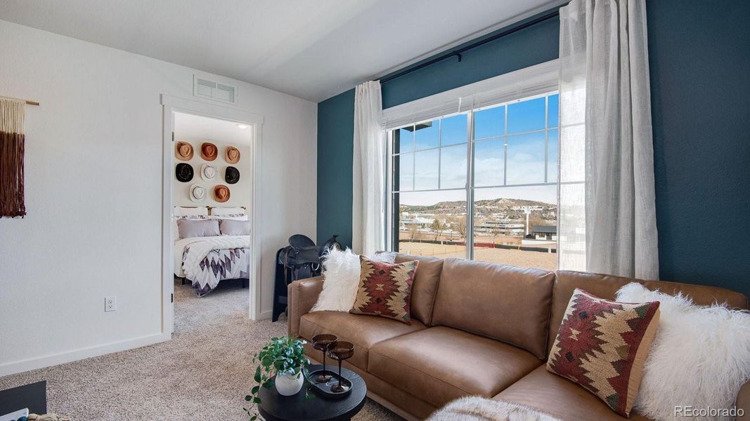 Furnished interior view inside a new home in The Ridge at Lorson Ranch, Colorado Springs (Image 7).