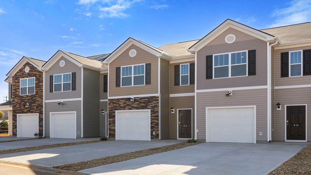 Front exterior of a new home in Brookside Ridge Townhomes, Greer, SC, highlighting curb appeal (Image 2).