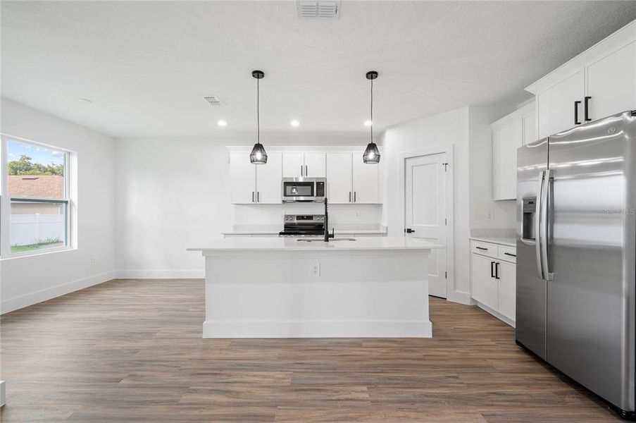 Furnished interior view inside a new home in , Deltona (Image 9).