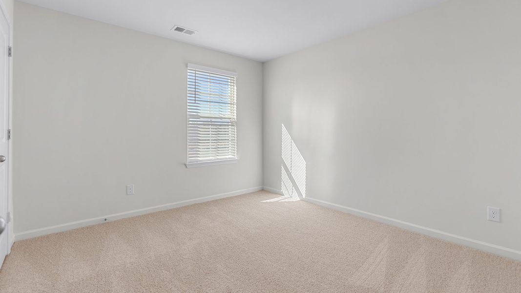 Representative unfurnished interior of a home built from the Hayden by D.R. Horton in Collett Farm, Trinity (Image 23).