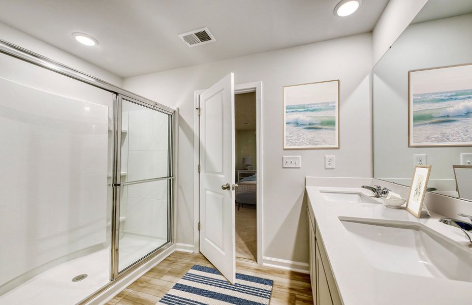 Owner's Suite bathroom showcases a large vanity wi