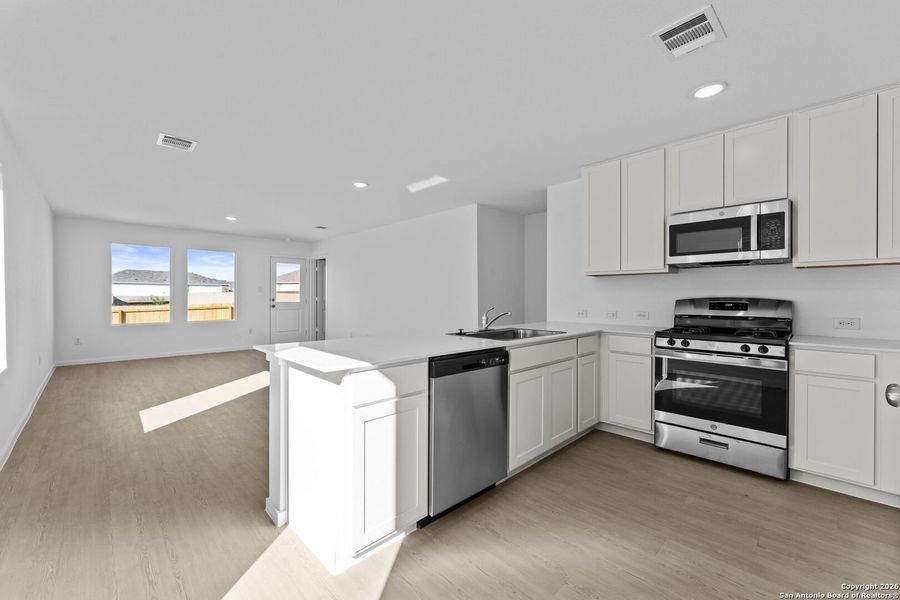 Furnished interior view inside a new home in , New Braunfels (Image 6).