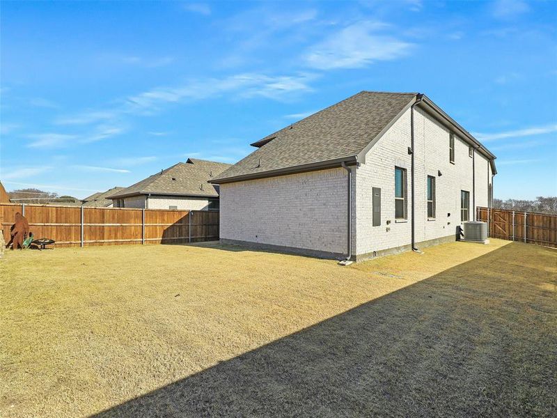 Exterior details and patio area of a home in Bel Air Village, Sherman (Image 24).