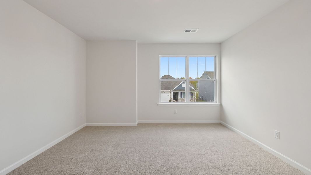 Spacious, unfurnished interior of a new home in Durbin Meadows Traditions, Fountain Inn (Image 24).