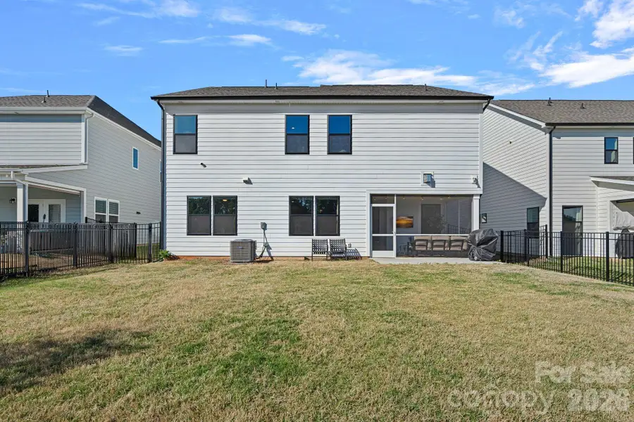 Exterior details and patio area of a home in , Huntersville (Image 4).