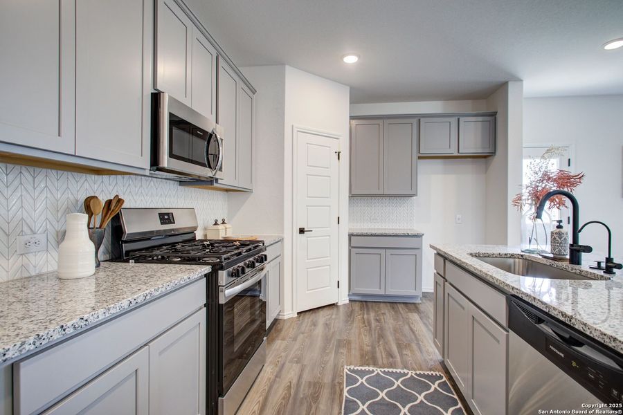 Furnished interior view inside a new home in Comanche Ridge, San Antonio (Image 49).