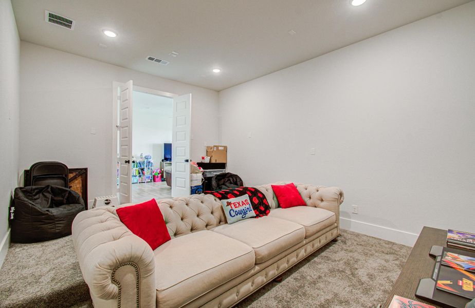 Furnished interior view inside a new home in , Manvel (Image 6).