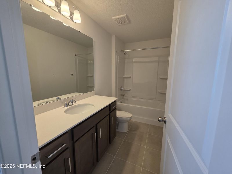 Furnished interior view inside a new home in Hyland Trail, Green Cove Springs (Image 9).