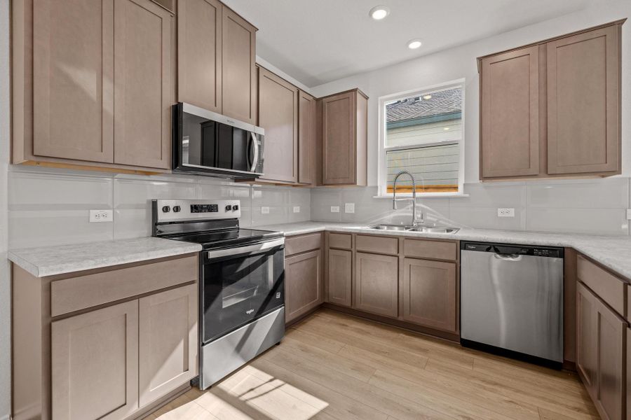 Furnished interior view inside a new home in Sonterra - Cool Water, Jarrell (Image 10).