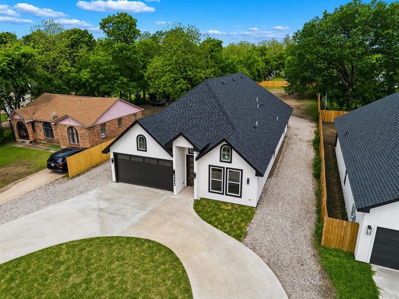 Front exterior of a new home in , Dallas, TX, highlighting curb appeal (Image 25).