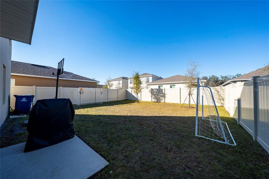Exterior details and patio area of a home in Cascades, Davenport (Image 3).