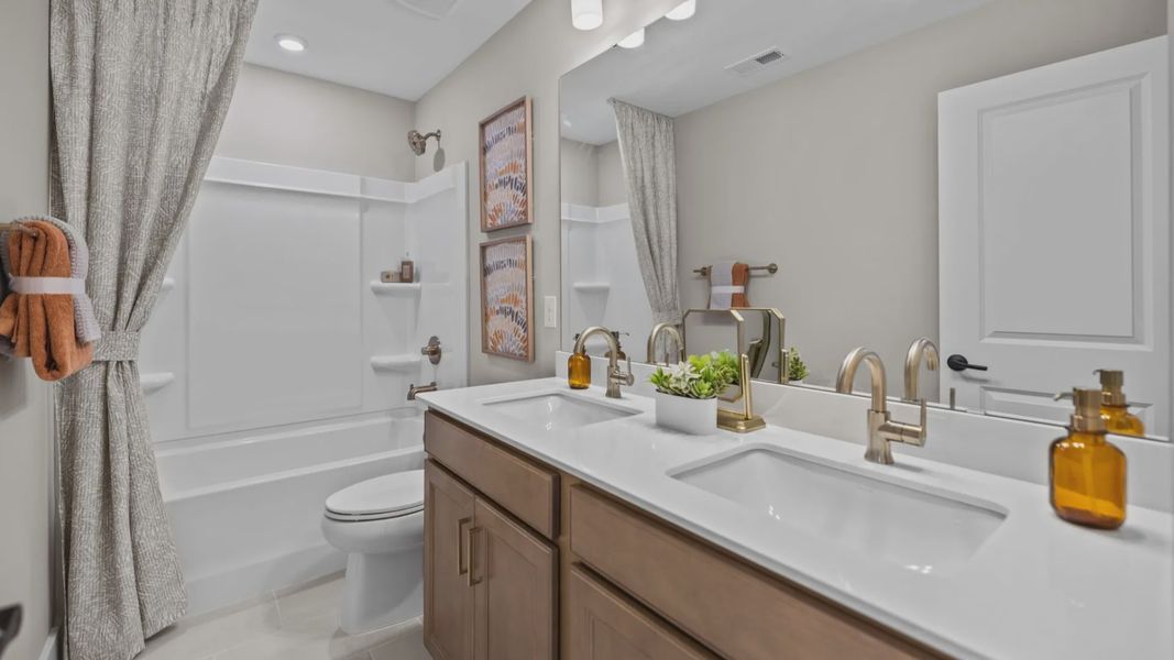 The Stonefield Home Plan in Michaux Garden by DRB Homes in Belmont, NC. - Bathroom