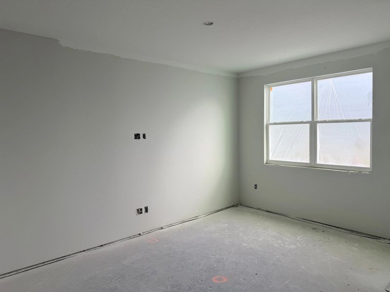 Family room space with two large windows - under construction