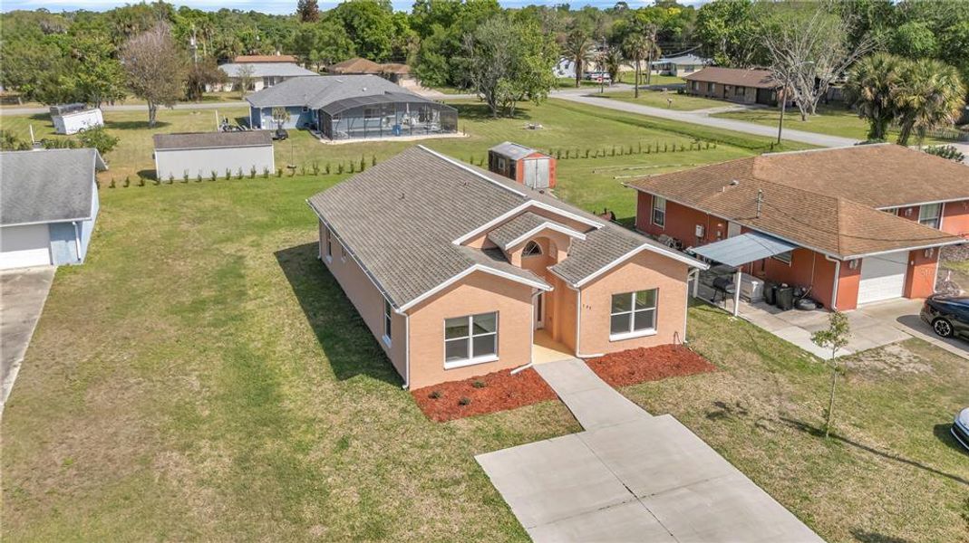 Front exterior of a new home in , New Smyrna Beach, FL, highlighting curb appeal (Image 2). Front exterior of a new home in , New Smyrna Beach, FL, highlighting curb appeal (Image 2).
