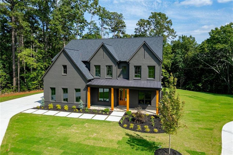 Front exterior of a new home in , Buford, GA, highlighting curb appeal (Image 32).