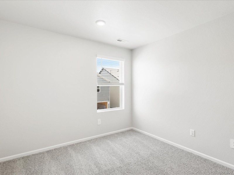 Spacious, unfurnished interior of a new home in Poudre Heights: The Meadow Collection, Windsor (Image 29).