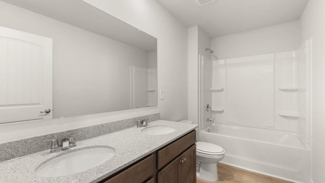 Furnished interior view inside a new home in Fairway 17 at Mirror Lake, Villa Rica (Image 8).