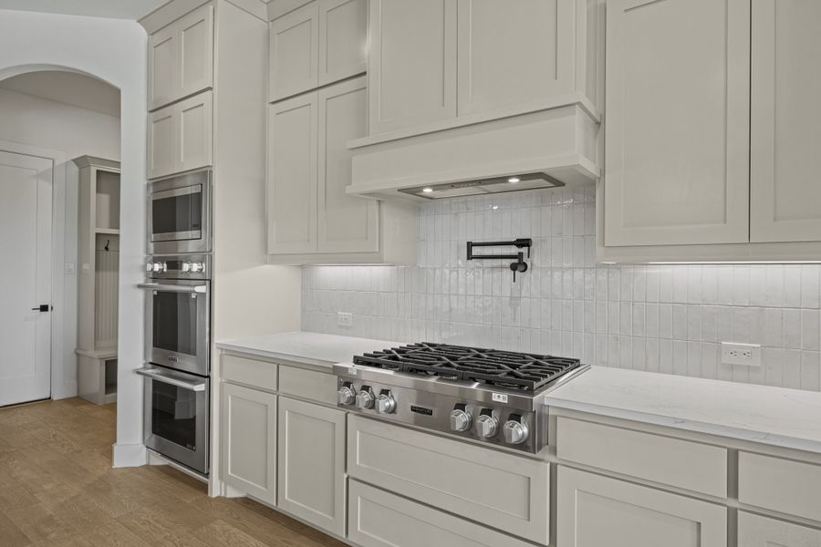 Furnished interior view inside a new home in Winding Creek, Rockwall (Image 15).