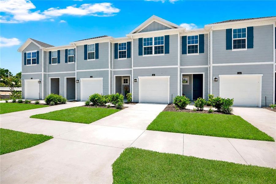 Front exterior of a new home in , Palm Coast, FL, highlighting curb appeal (Image 23).