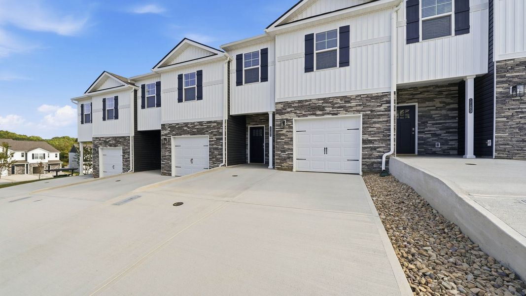 Front exterior of a new home in The Arbor Townhomes, Kingsport, TN, highlighting curb appeal (Image 16).