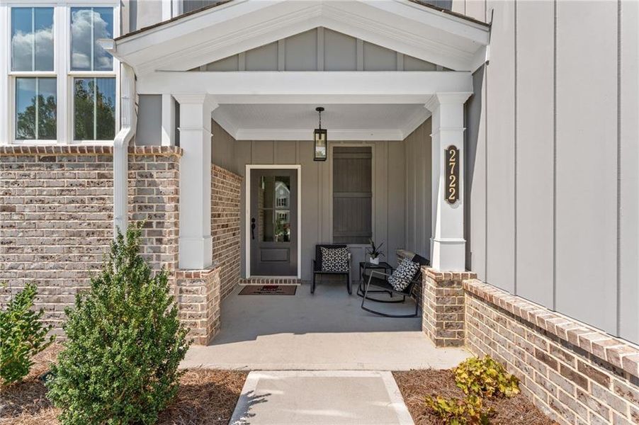 Front exterior of a new home in Oak Valley Estates, Marietta, GA, highlighting curb appeal (Image 19).