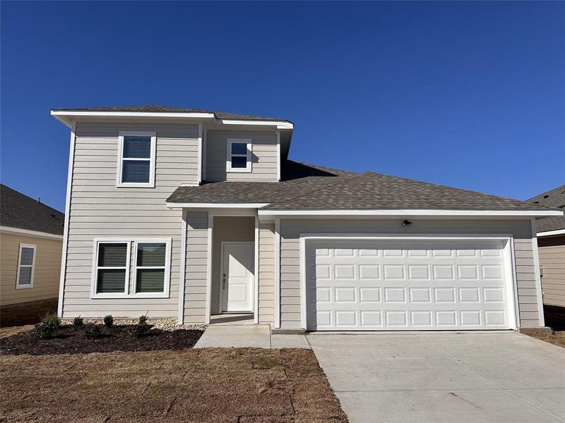 Front facade featuring a garage