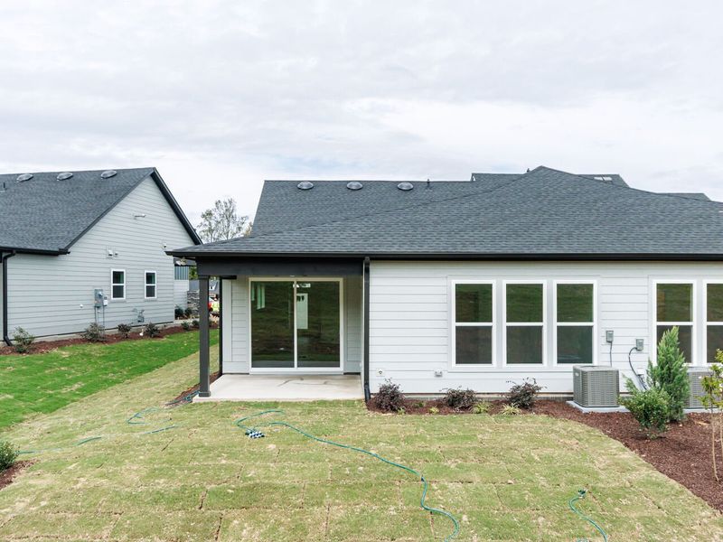 Exterior details and patio area of a home in Encore at Chatham Park – Villa Series, Pittsboro (Image 3).