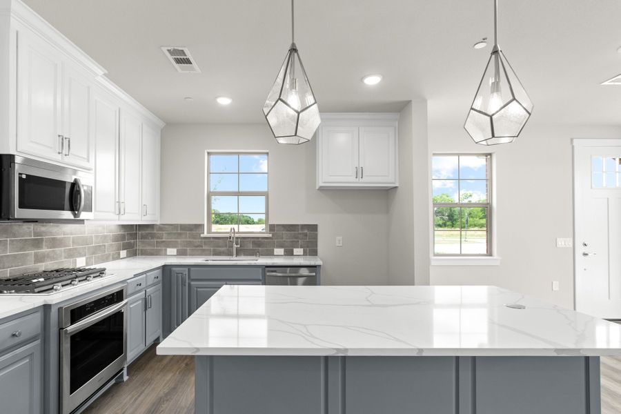 Furnished interior view inside a new home in The Tribute, The Colony (Image 9).