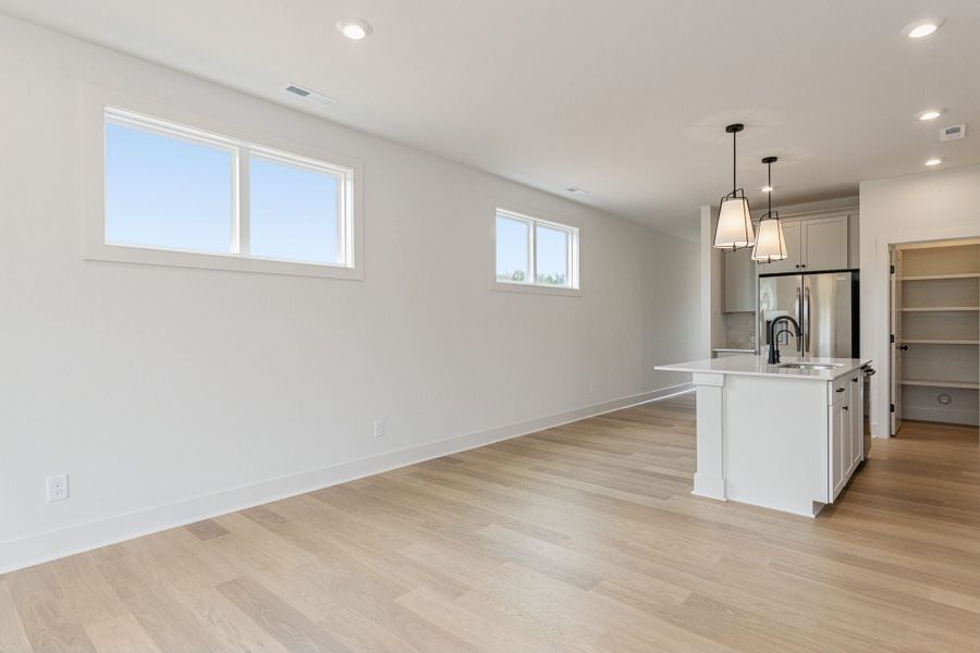 Representative unfurnished interior of a home built from the Lumen C by Homes by Dickerson in Chatham Park, Pittsboro (Image 13).