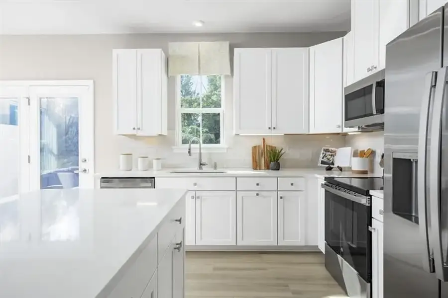 Representative furnished interior of a home built from the Odessa by Ryan Homes in Townes At Abner Creek, Greer (Image 5).