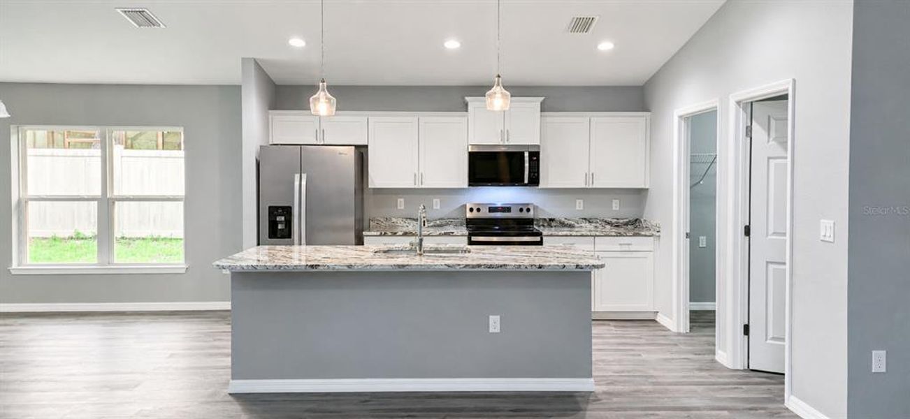 Furnished interior view inside a new home in , Summerfield (Image 5).