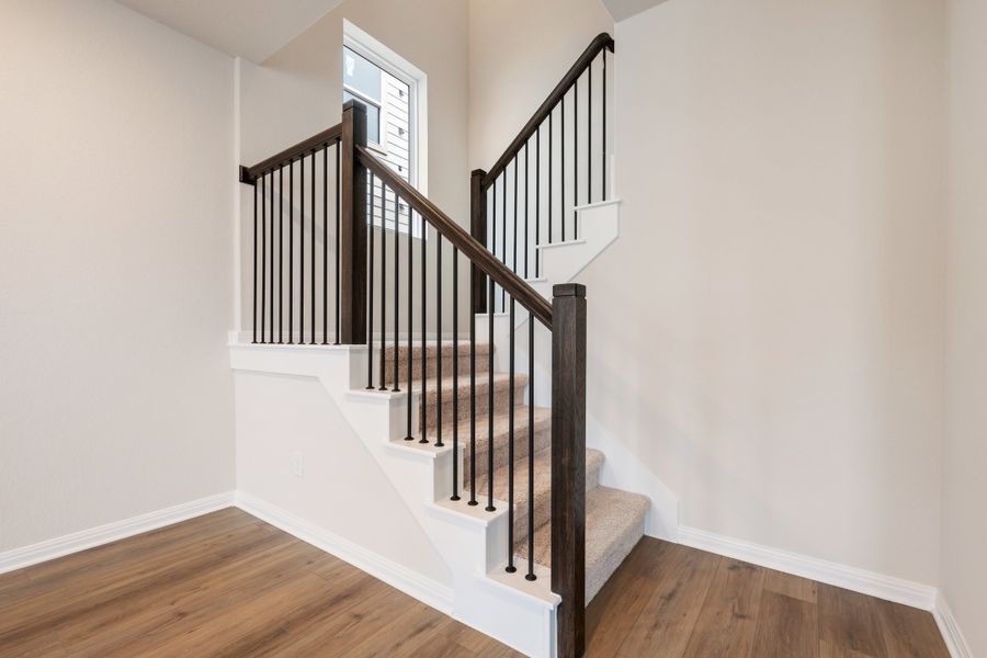 Representative unfurnished interior of a home built from the Robin by Ashton Woods in The Cottages at Lariat, Liberty Hill (Image 38). Representative unfurnished interior of a home built from the Robin by Ashton Woods in The Cottages at Lariat, Liberty Hill (Image 38).