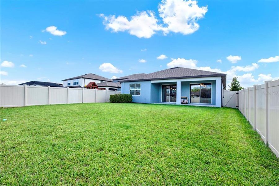 Front exterior of a new home in , Land O' Lakes, FL, highlighting curb appeal (Image 2).