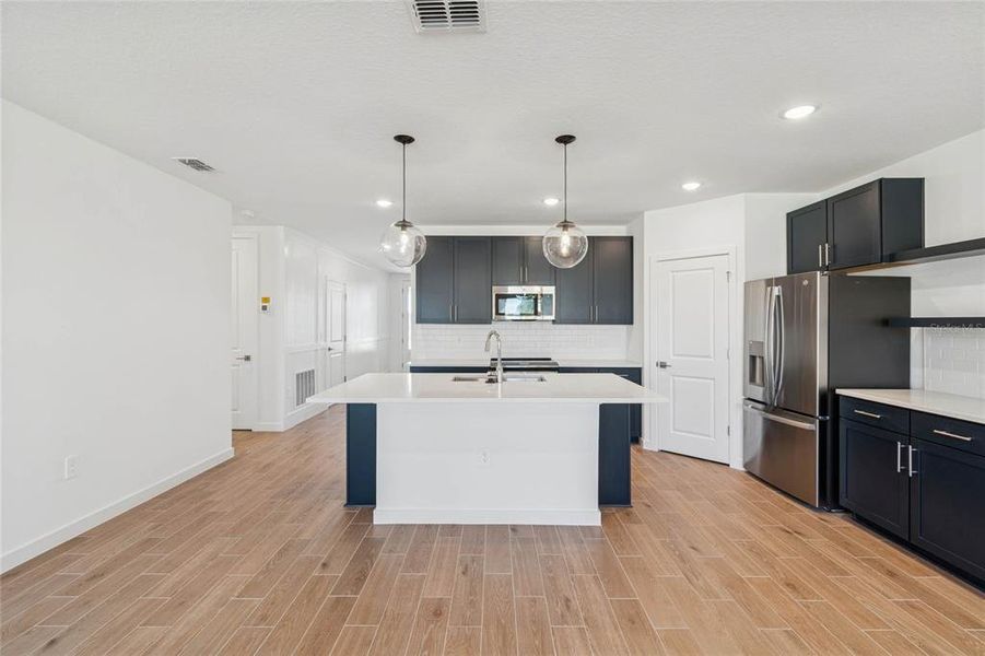 Furnished interior view inside a new home in Aspire at Canter Creek, Davenport (Image 15).