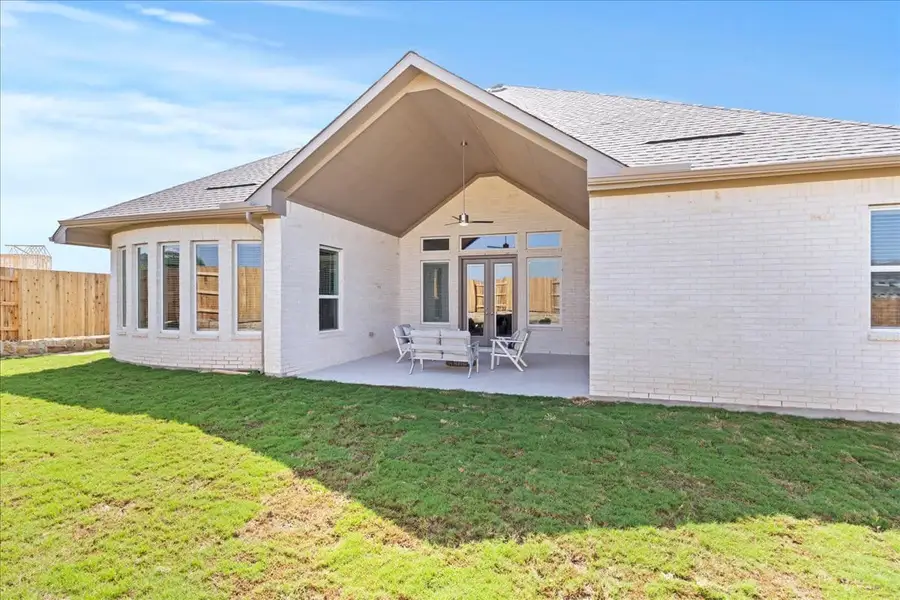 Exterior details and patio area of a home in Sunfield, Buda (Image 4). Exterior details and patio area of a home in Sunfield, Buda (Image 4).