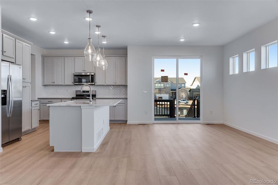 Furnished interior view inside a new home in Crescendo at The Aurora Highlands, Aurora (Image 6).