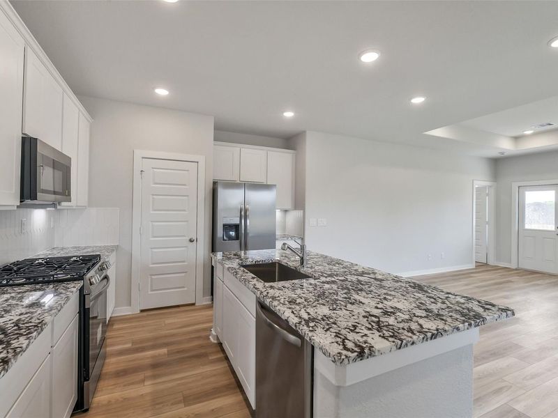 Furnished interior view inside a new home in Windmill Estates, Magnolia (Image 6).
