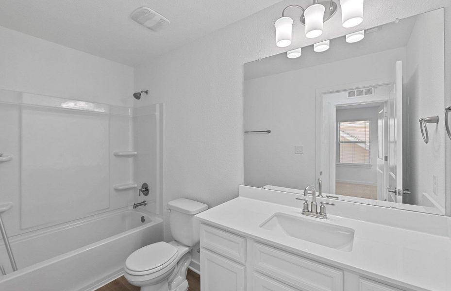 Furnished interior view inside a new home in Santa Rita Ranch, Liberty Hill (Image 6). Furnished interior view inside a new home in Santa Rita Ranch, Liberty Hill (Image 6).