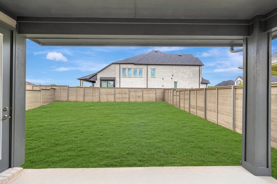 Exterior details and patio area of a home in Treeline, Justin (Image 19).