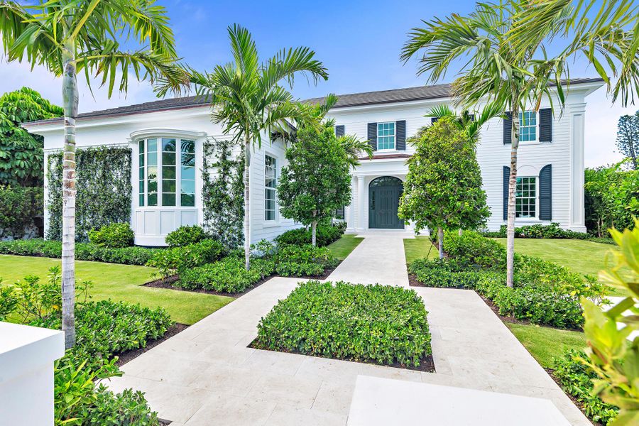 Front exterior of a new home in , West Palm Beach, FL, highlighting curb appeal (Image 23). Front exterior of a new home in , West Palm Beach, FL, highlighting curb appeal (Image 23).