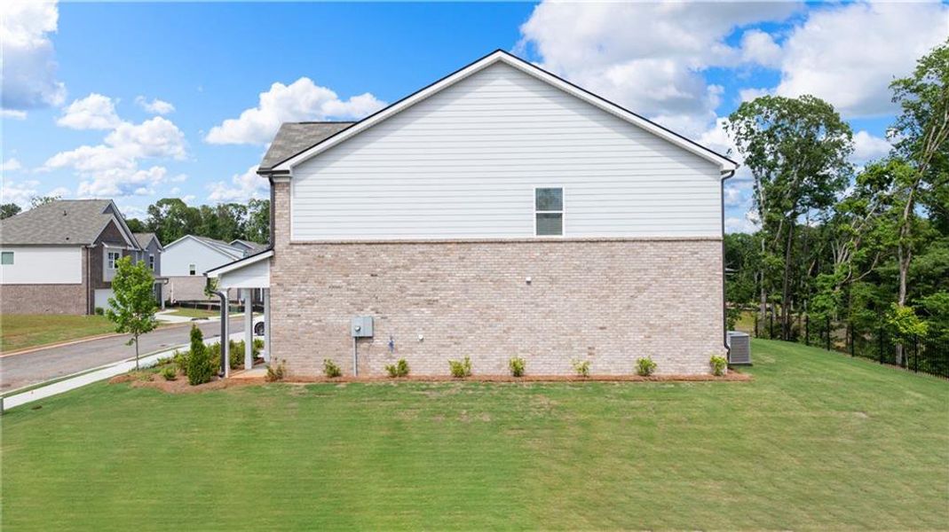 Exterior details and patio area of a home in Alcovy Village, Lawrenceville (Image 37).