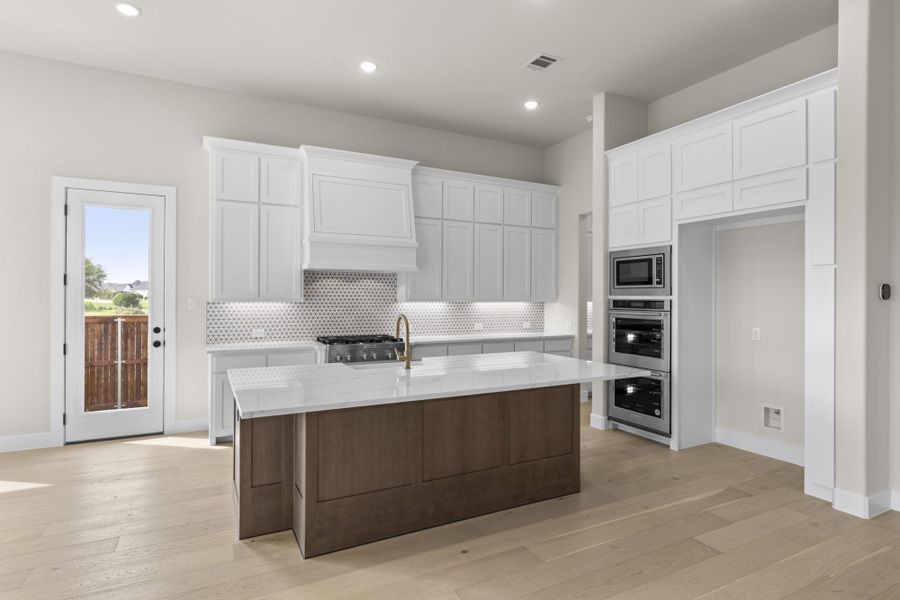 Representative furnished interior of a home built from the 5511 by Tradition Homes in Mustang Lakes, McKinney (Image 8).
