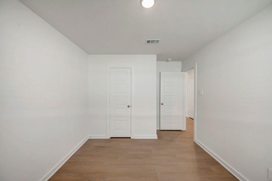 Spacious, unfurnished interior of a new home in Pinewood at Grand Texas, New Caney (Image 13). Spacious, unfurnished interior of a new home in Pinewood at Grand Texas, New Caney (Image 13).