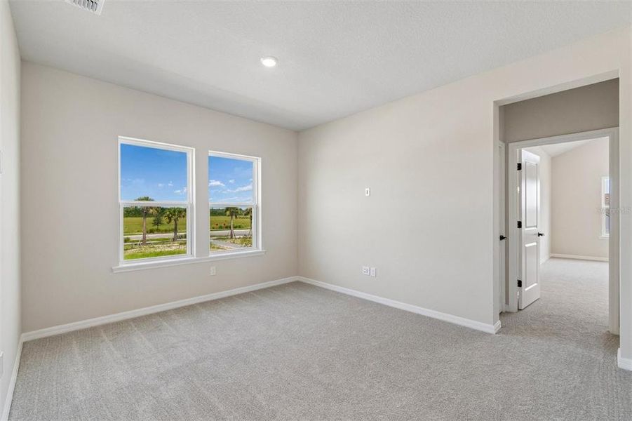 Spacious, unfurnished interior of a new home in Weslyn Park in Sunbridge 34', St. Cloud (Image 25).