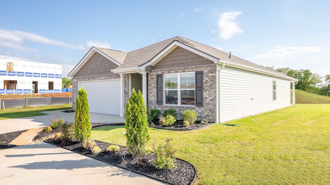 Front exterior of a new home in Crescent Ridge, Niota, TN, highlighting curb appeal (Image 2).