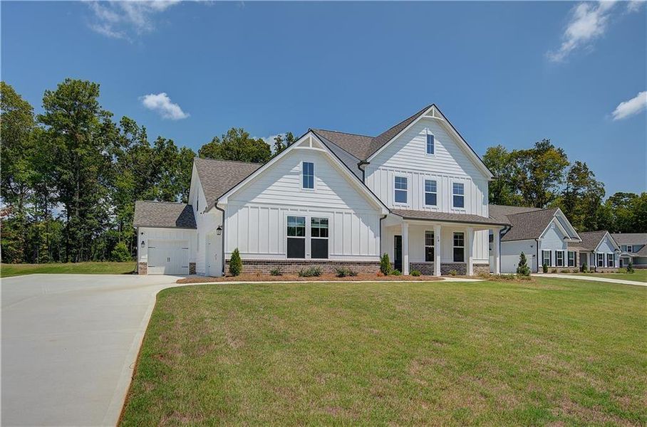 Front exterior of a new home in , Senoia, GA, highlighting curb appeal (Image 17).