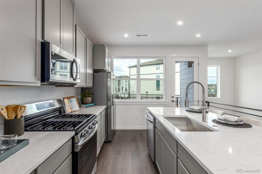 Furnished interior view inside a new home in The Commons at Victory Ridge, Colorado Springs (Image 9).