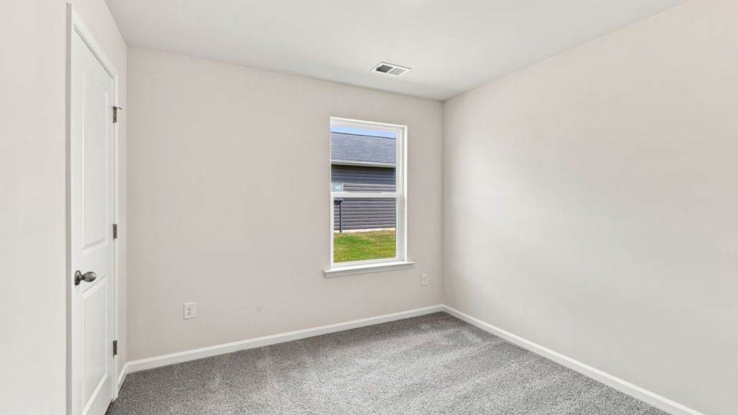 Spacious, unfurnished interior of a new home in Village 3, Woodruff (Image 21).